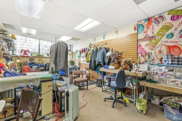 miscellaneous room featuring a paneled ceiling