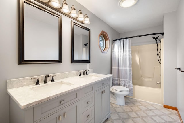 full bathroom with shower / bath combo, toilet, and vanity