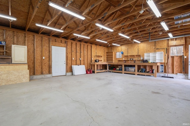 garage with a workshop area