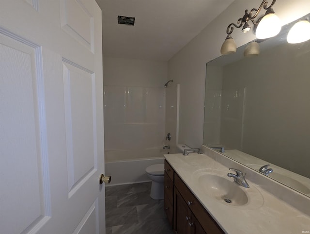 full bathroom featuring vanity, toilet, and washtub / shower combination