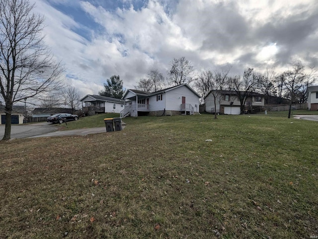 exterior space featuring a front lawn