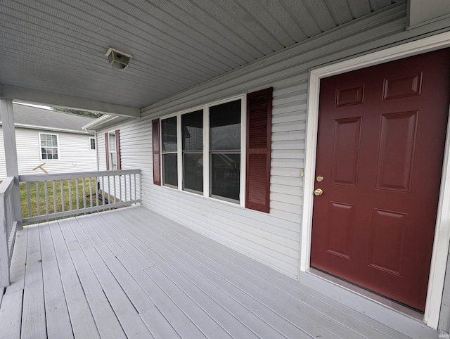 wooden deck featuring a porch