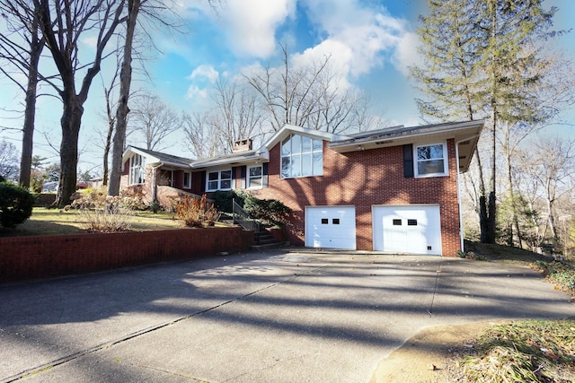 view of side of home with a garage