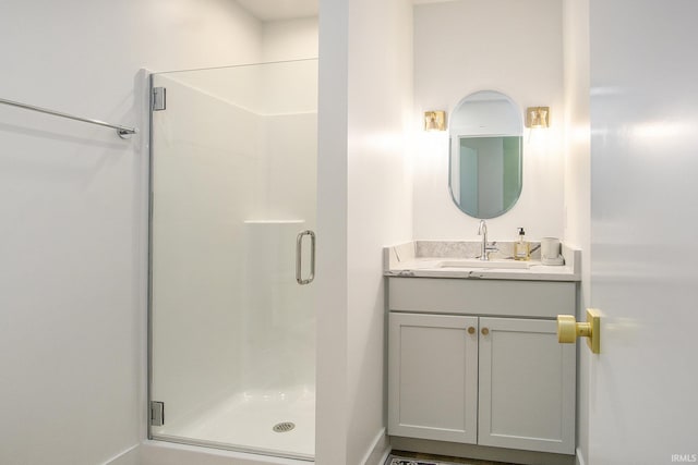 bathroom with vanity and walk in shower