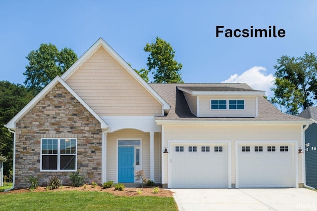 craftsman inspired home featuring a front yard and a garage