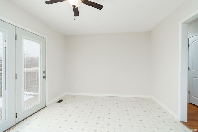 spare room with ceiling fan