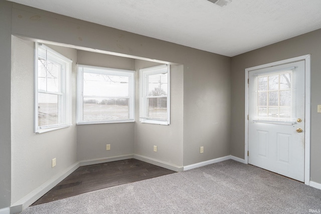 foyer featuring hardwood / wood-style flooring