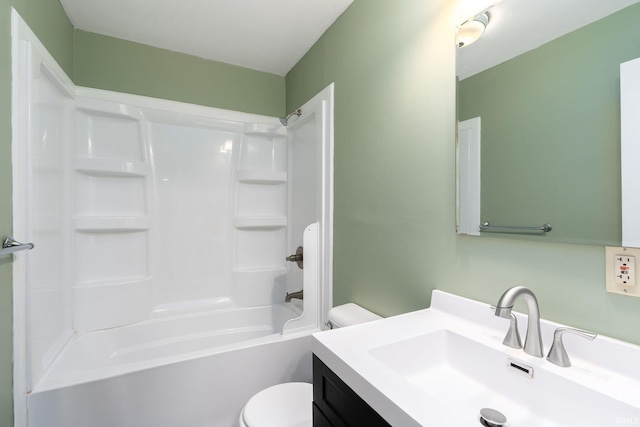 full bathroom with washtub / shower combination, vanity, and toilet