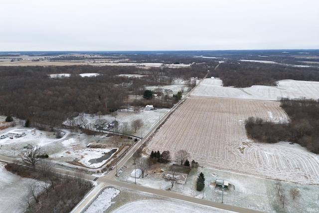 snowy aerial view with a rural view