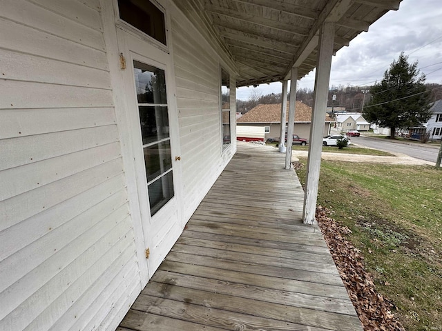 wooden terrace with covered porch