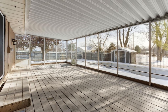 unfurnished sunroom featuring plenty of natural light