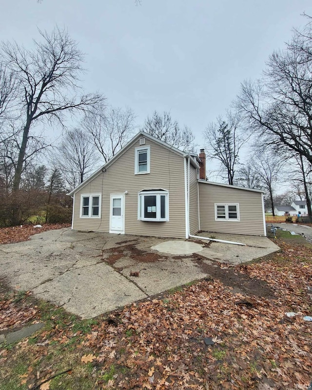 rear view of house featuring a patio area