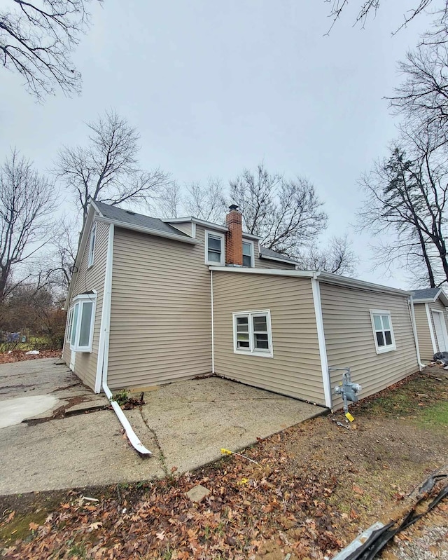 rear view of house featuring a patio area