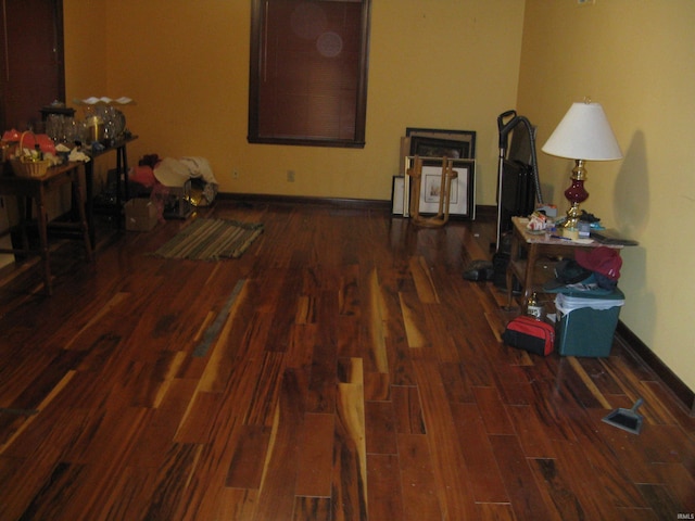 hallway featuring dark hardwood / wood-style floors