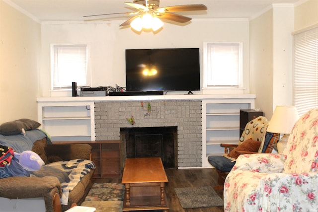 living room featuring crown molding, a wealth of natural light, and dark wood-type flooring