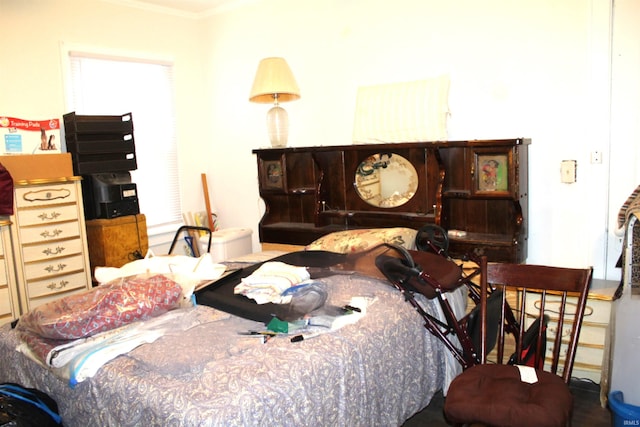 bedroom with crown molding