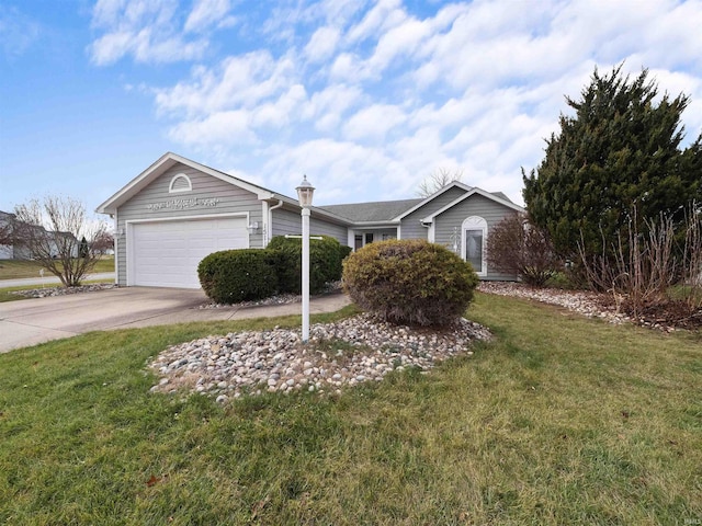 ranch-style home featuring a front yard and a garage