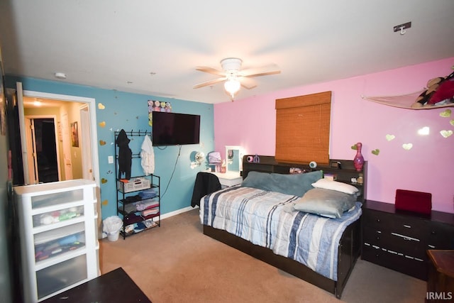 bedroom with ceiling fan and carpet