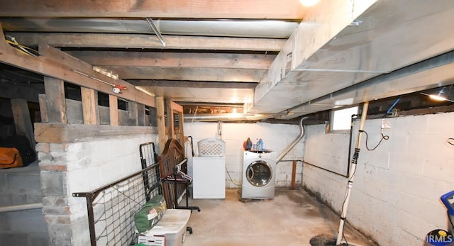 basement featuring separate washer and dryer