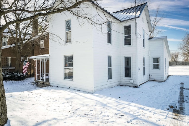 view of snow covered property