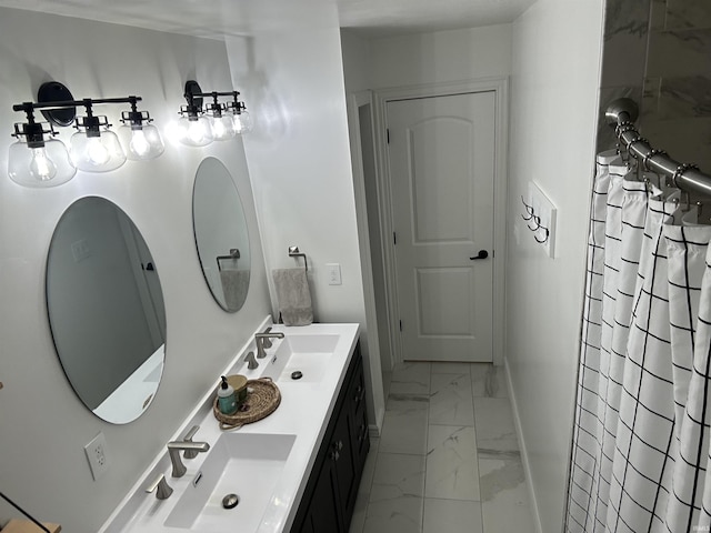 bathroom featuring a shower with shower curtain and vanity