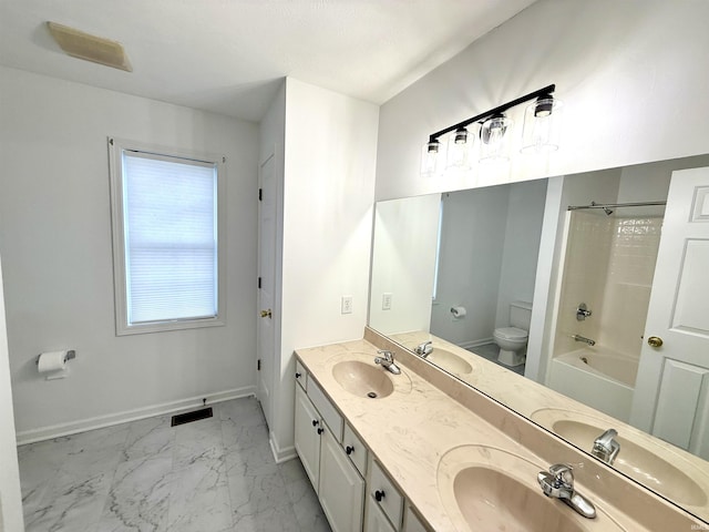 full bathroom with toilet, vanity, and bathtub / shower combination