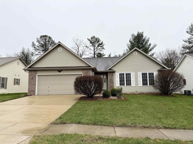 ranch-style house featuring a front yard, central AC unit, and a garage