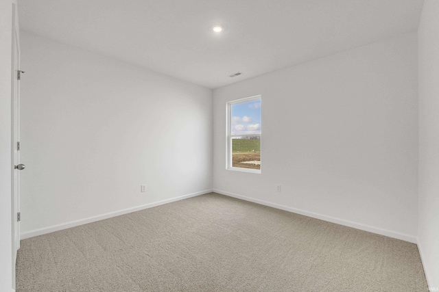 spare room featuring carpet flooring