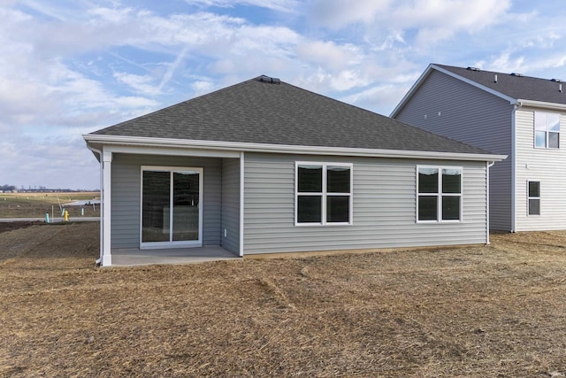 back of property with a patio area