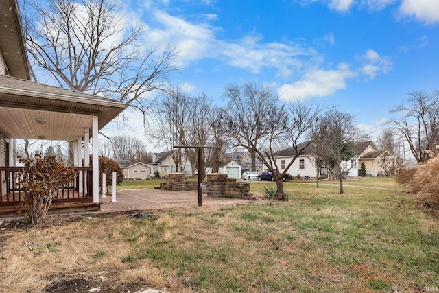 view of yard featuring a porch