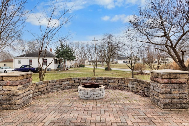 view of patio / terrace with a fire pit