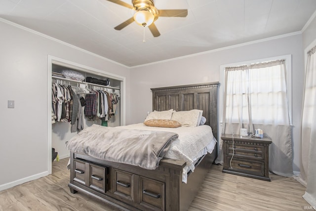 bedroom featuring light wood-type flooring, a closet, crown molding, and ceiling fan