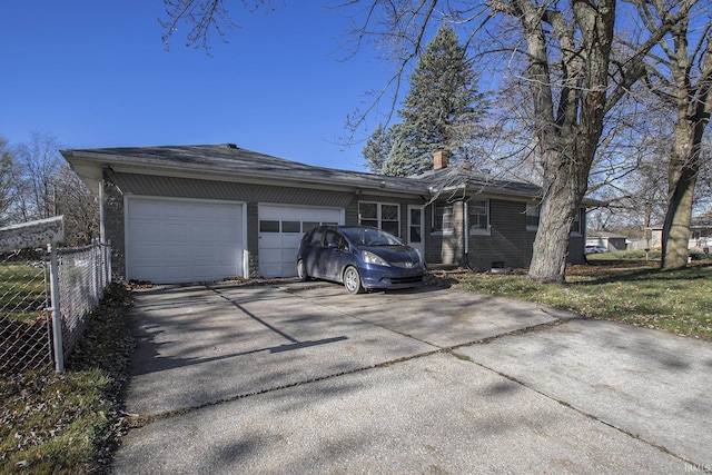 ranch-style house featuring a garage