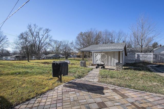 view of patio with a storage shed