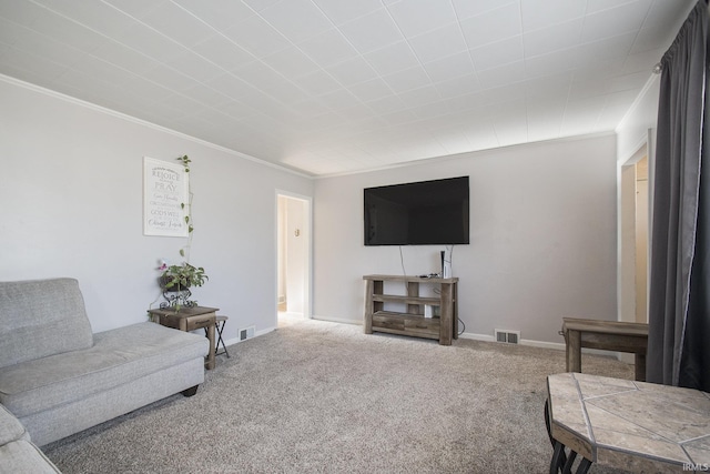 carpeted living room featuring ornamental molding