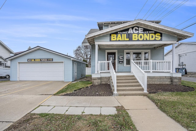 view of front facade featuring a porch and a garage