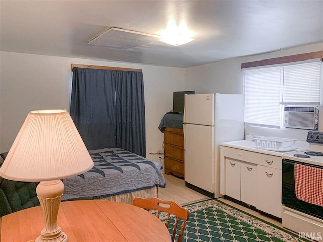 230 Vine St, Mount Vernon, IN 47620 - bedroom with freestanding refrigerator and cooling unit