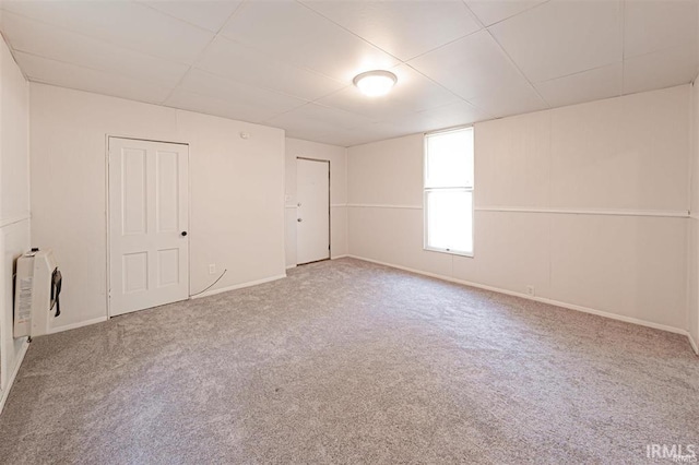 230 Vine St, Mount Vernon, IN 47620 - spare room featuring heating unit, baseboards, and carpet