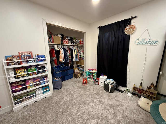 bedroom featuring a closet and carpet floors