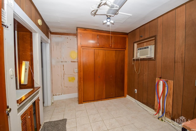 interior space featuring wood walls