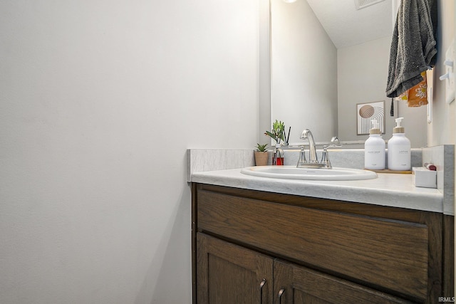 bathroom featuring vanity and a textured ceiling