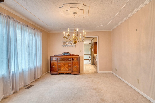 unfurnished dining area featuring carpet flooring, crown molding, a textured ceiling, and a notable chandelier