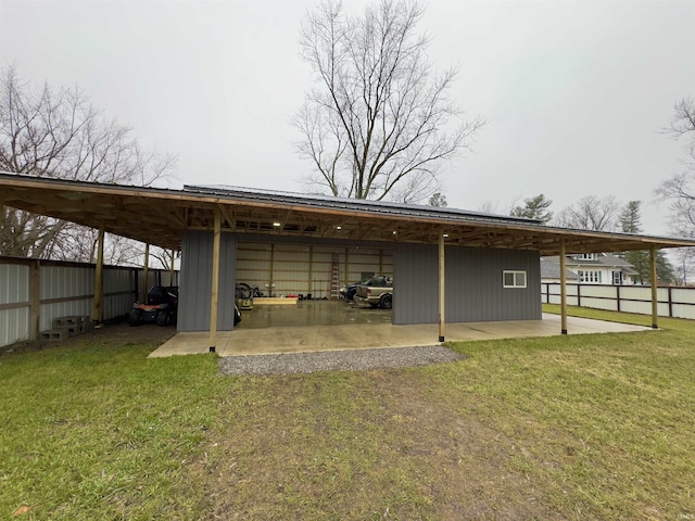 view of car parking featuring a yard