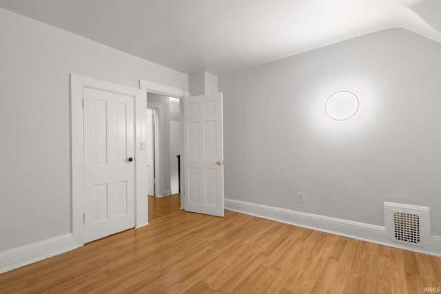 unfurnished bedroom featuring light hardwood / wood-style floors