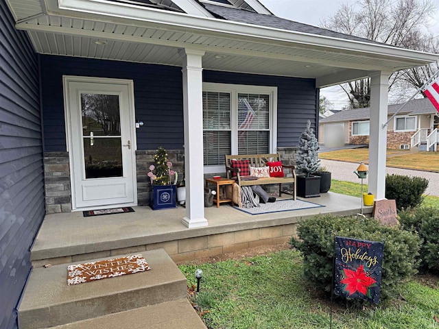 entrance to property featuring covered porch