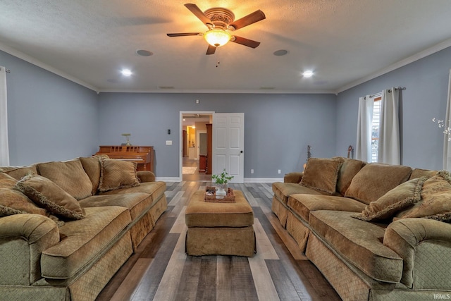 living room featuring a textured ceiling, crown molding, ceiling fan, and dark hardwood / wood-style floors