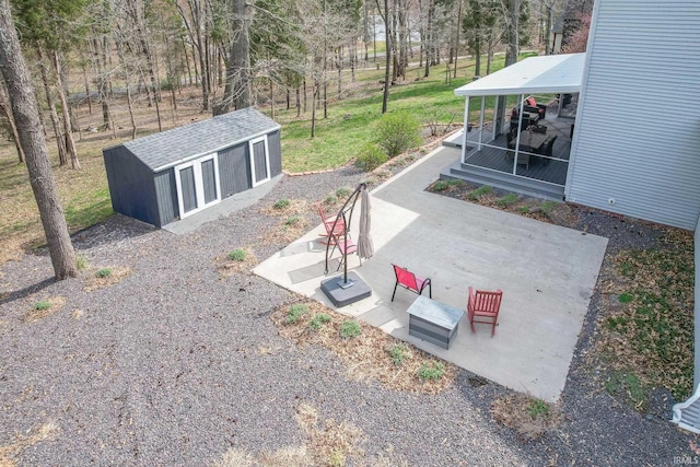 394 W Evergreen Plz, Santa Claus, IN 47579 - view of yard featuring an outbuilding and a patio