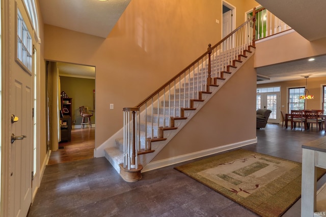 394 W Evergreen Plz, Santa Claus, IN 47579 - stairway with a high ceiling and baseboards