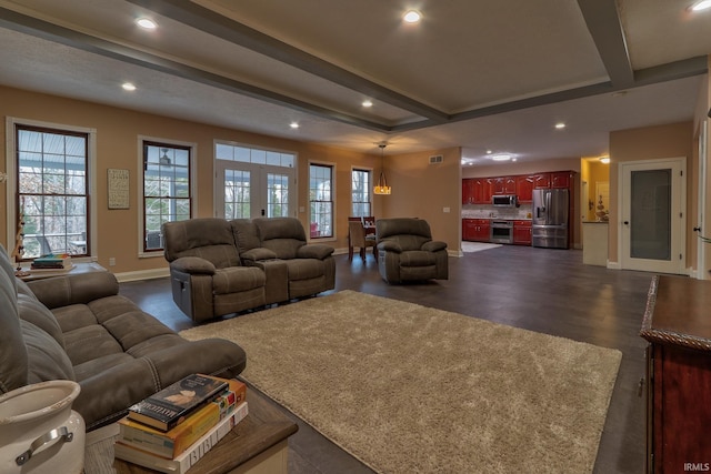 living room with beamed ceiling, french doors, and dark hardwood / wood-style flooring