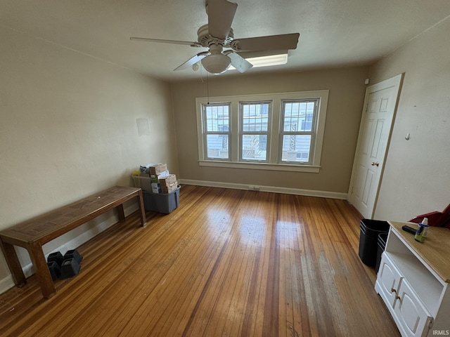 unfurnished room featuring ceiling fan and light wood-type flooring